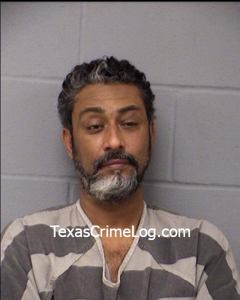 Midhat Omer (Travis County Central Booking)