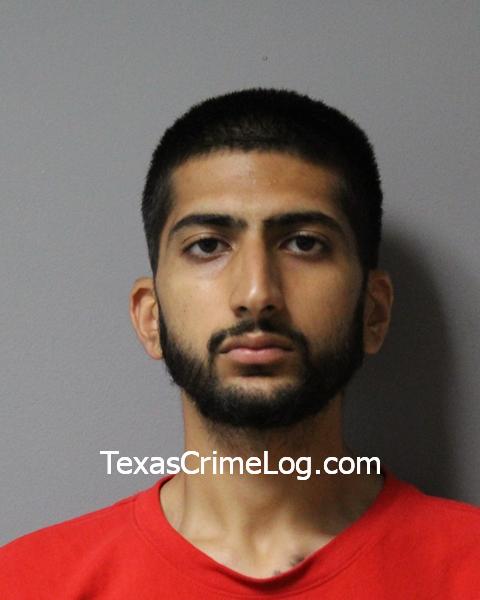 Aly Boodhwani (Travis County Central Booking)